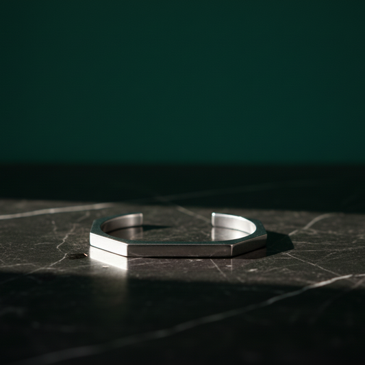 The Heptagon Eclipse: Handcrafted Geometric Titanium Cuff